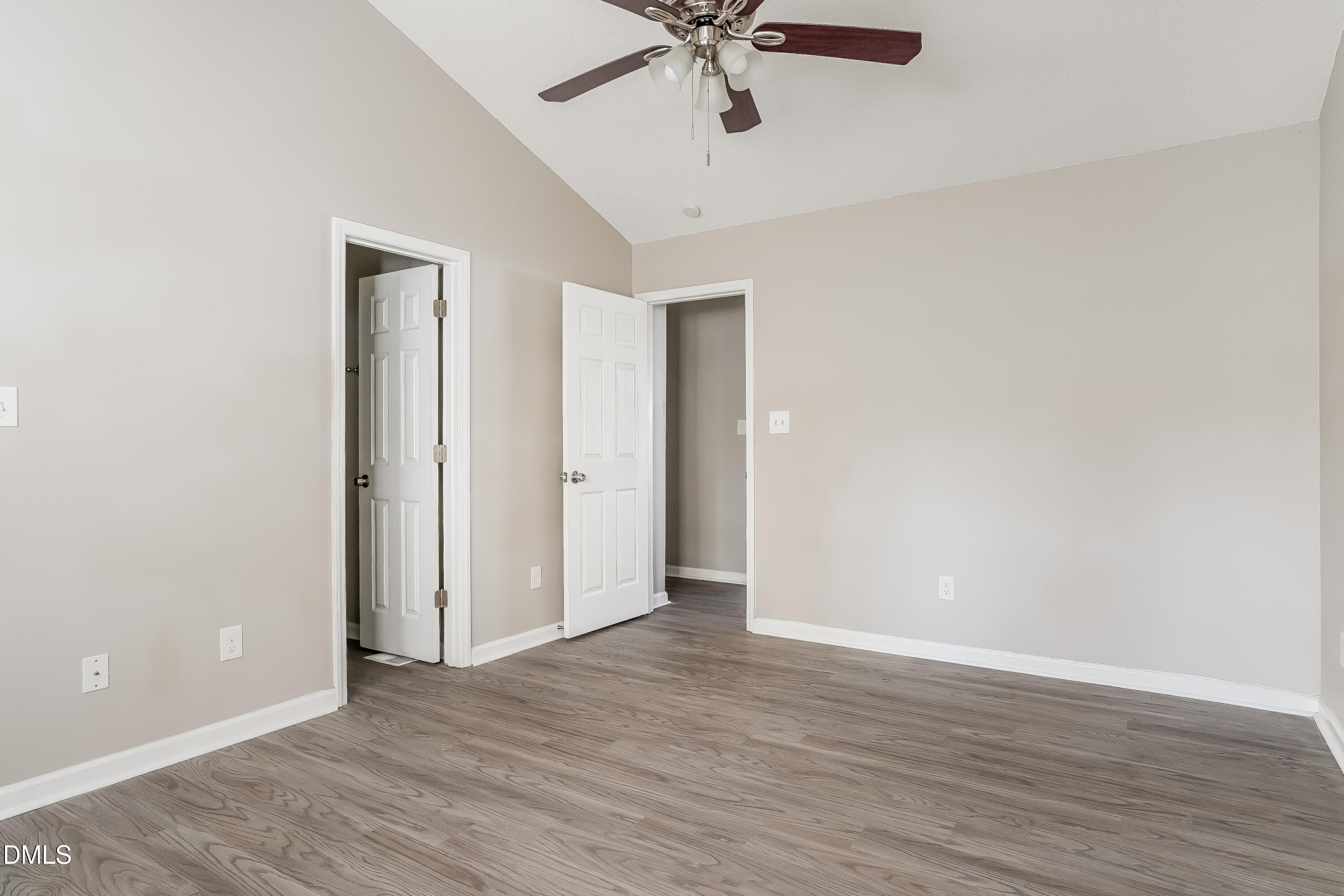 1410 Mandolin Place Zebulon, NC 27597 - Photo 8 of 16 a view of an empty room with wooden floor