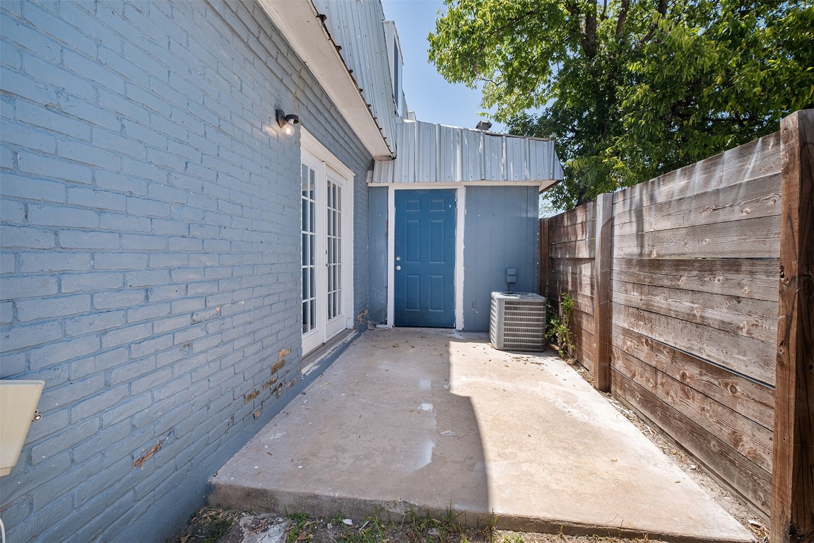 2217 Mission Hill Drive, Unit C Austin, TX 78741 - Photo 16 of 17 a view of a house with wooden fence