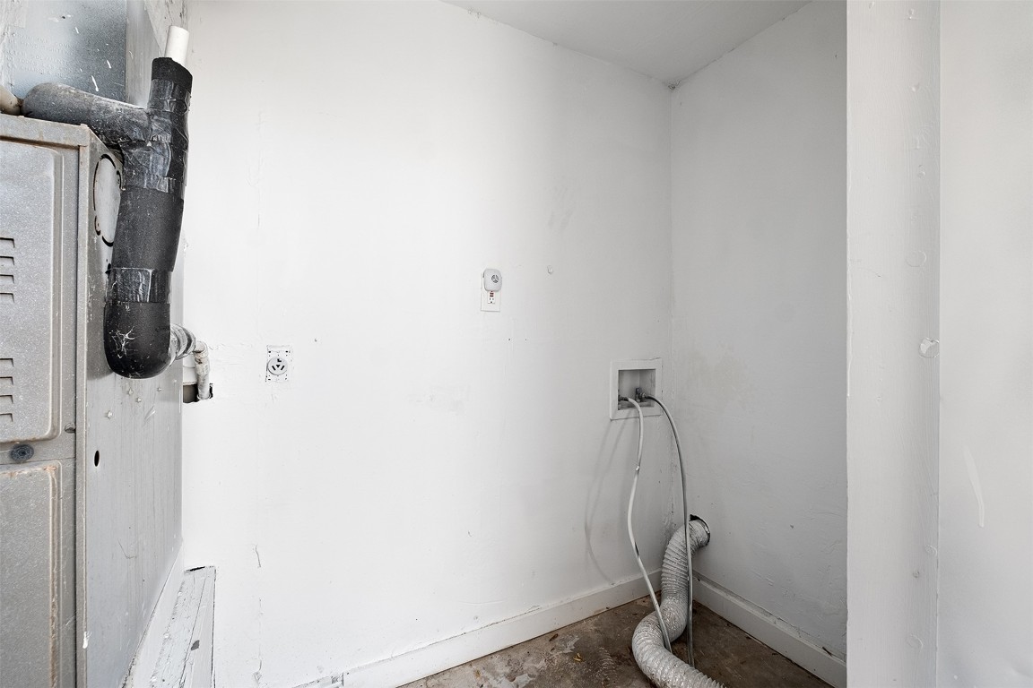 2217 Mission Hill Drive, Unit C Austin, TX 78741 - Photo 17 of 17 a bathroom with a granite countertop shower