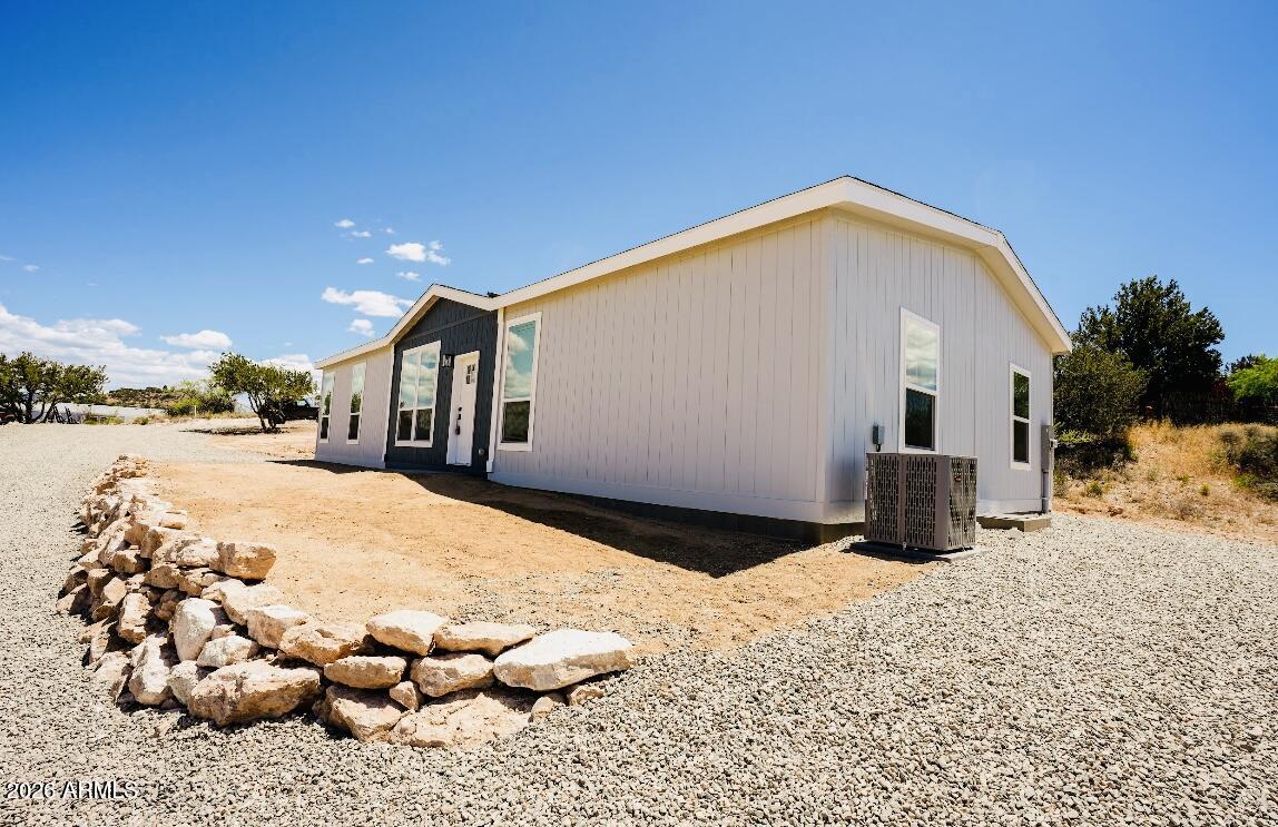 4710 Lazy Lariat Lane Rimrock, AZ 86335 - Photo 3 of 19 a view of a backyard of the house