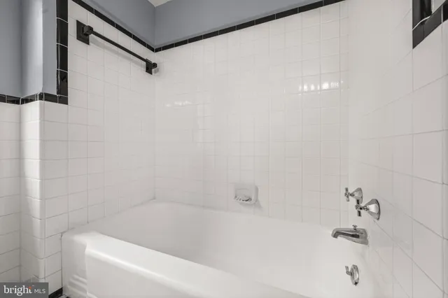 a bathroom with a bathtub