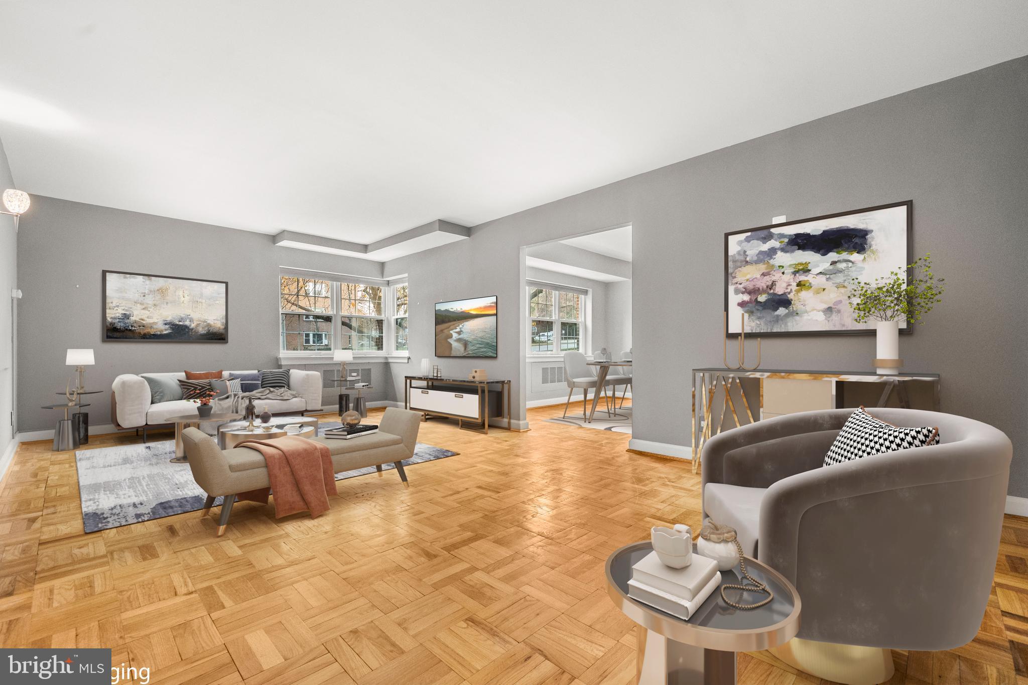 3601 Greenway, Unit 101 Baltimore, MD 21218 - Photo 2 of 32 a living room with furniture and a window