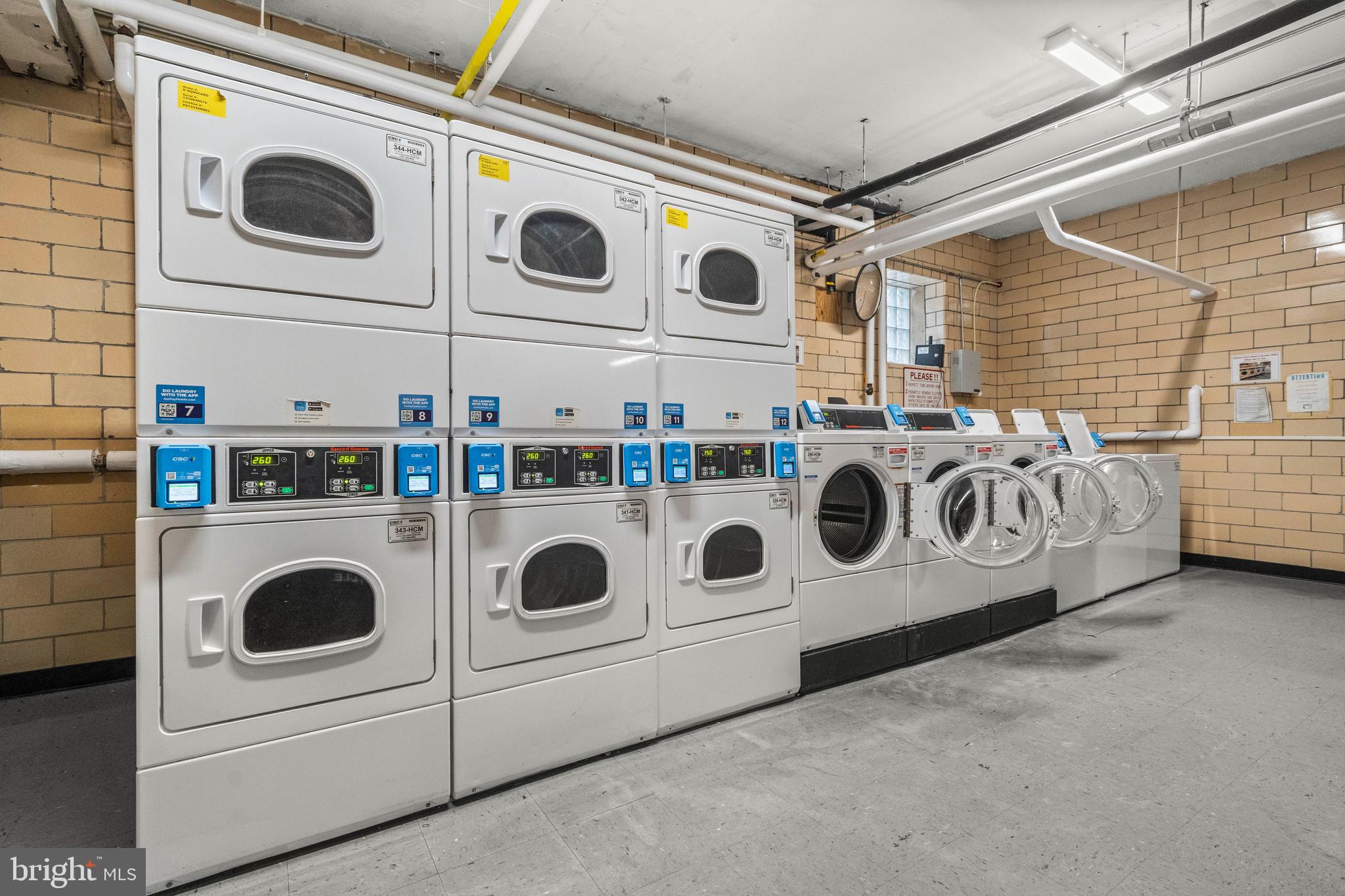 3601 Greenway, Unit 101 Baltimore, MD 21218 - Photo 27 of 32 a utility room with dryer and washer