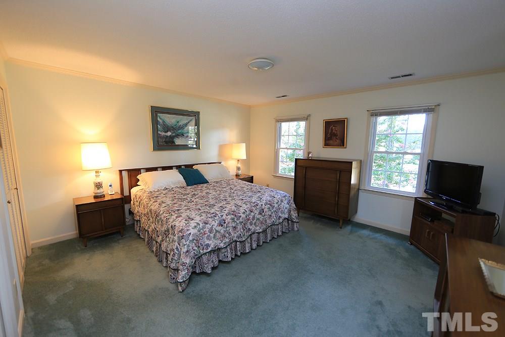 7905 Hardwick Drive Raleigh, NC 27615 - Photo 13 of 26 The master bedroom accommodates a king size bed, triple dresser and more!