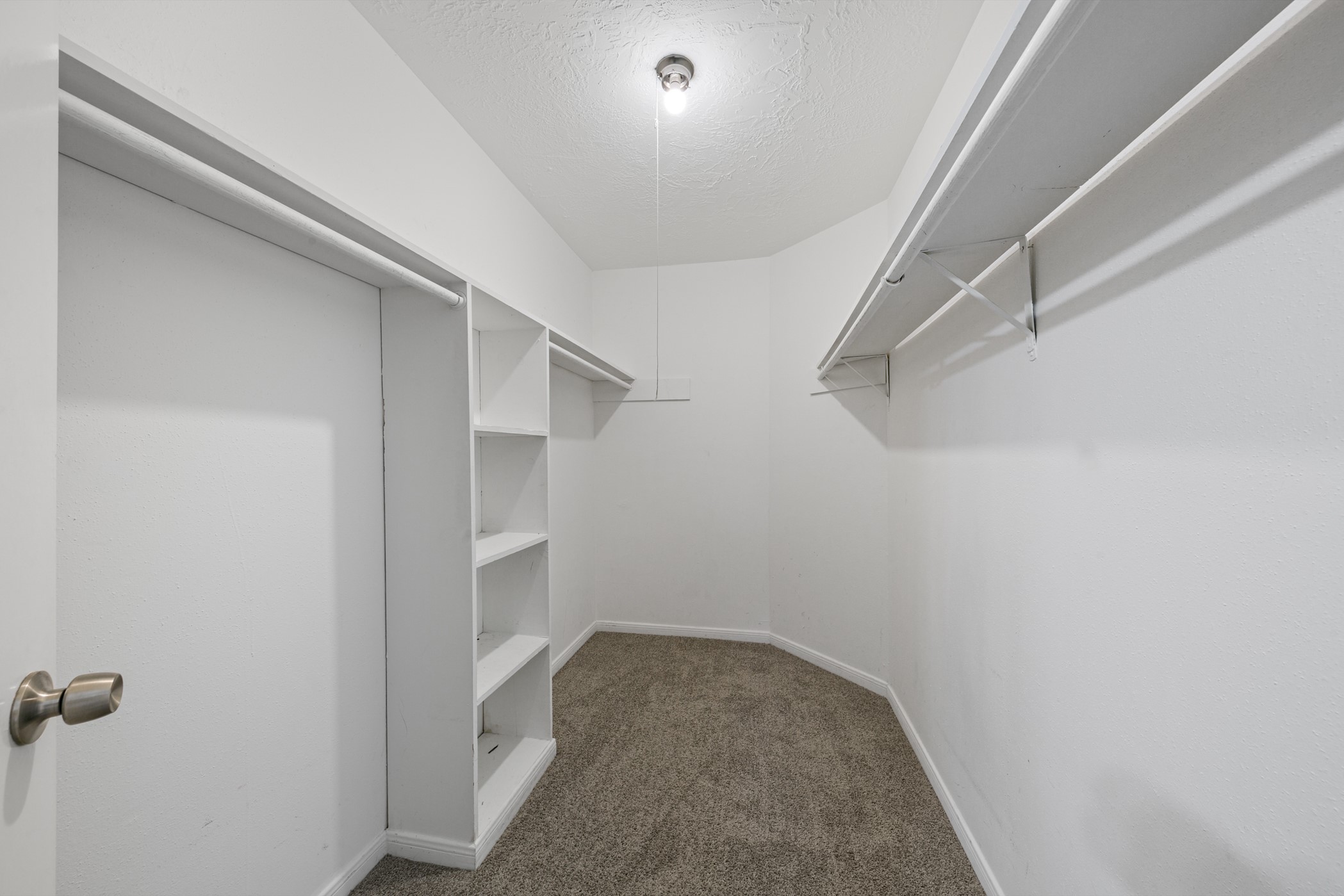 10530 Rippling Fields Drive Houston, TX 77064 - Photo 22 of 30 a view of an empty walk in closet