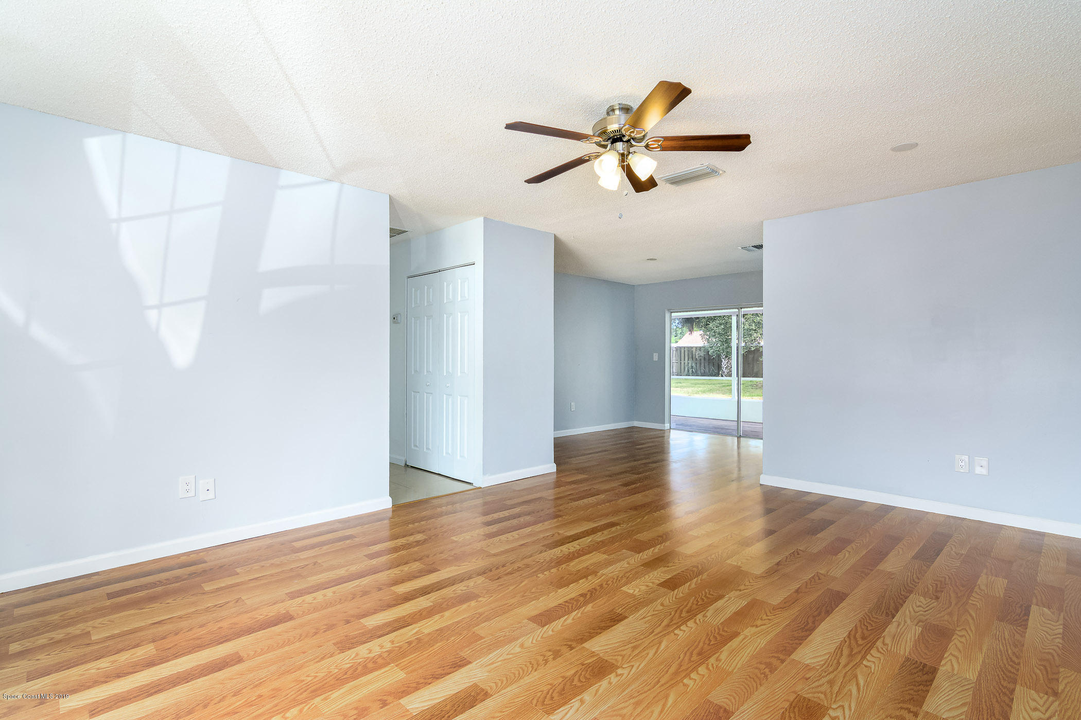 1111 Cotton Road Northeast Palm Bay, FL 32905 - Photo 4 of 27 Living/Dining