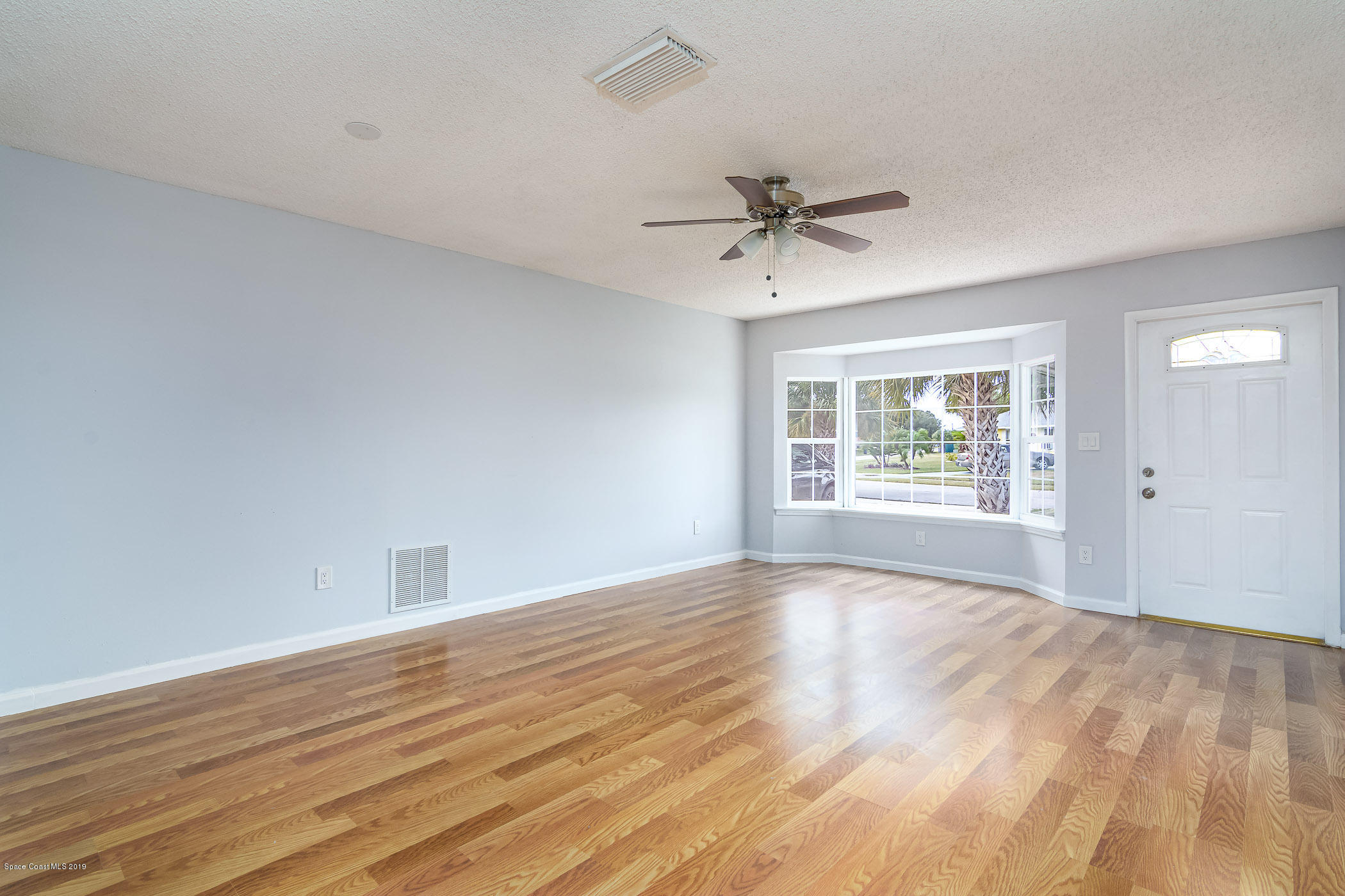 1111 Cotton Road Northeast Palm Bay, FL 32905 - Photo 5 of 27 Living Room