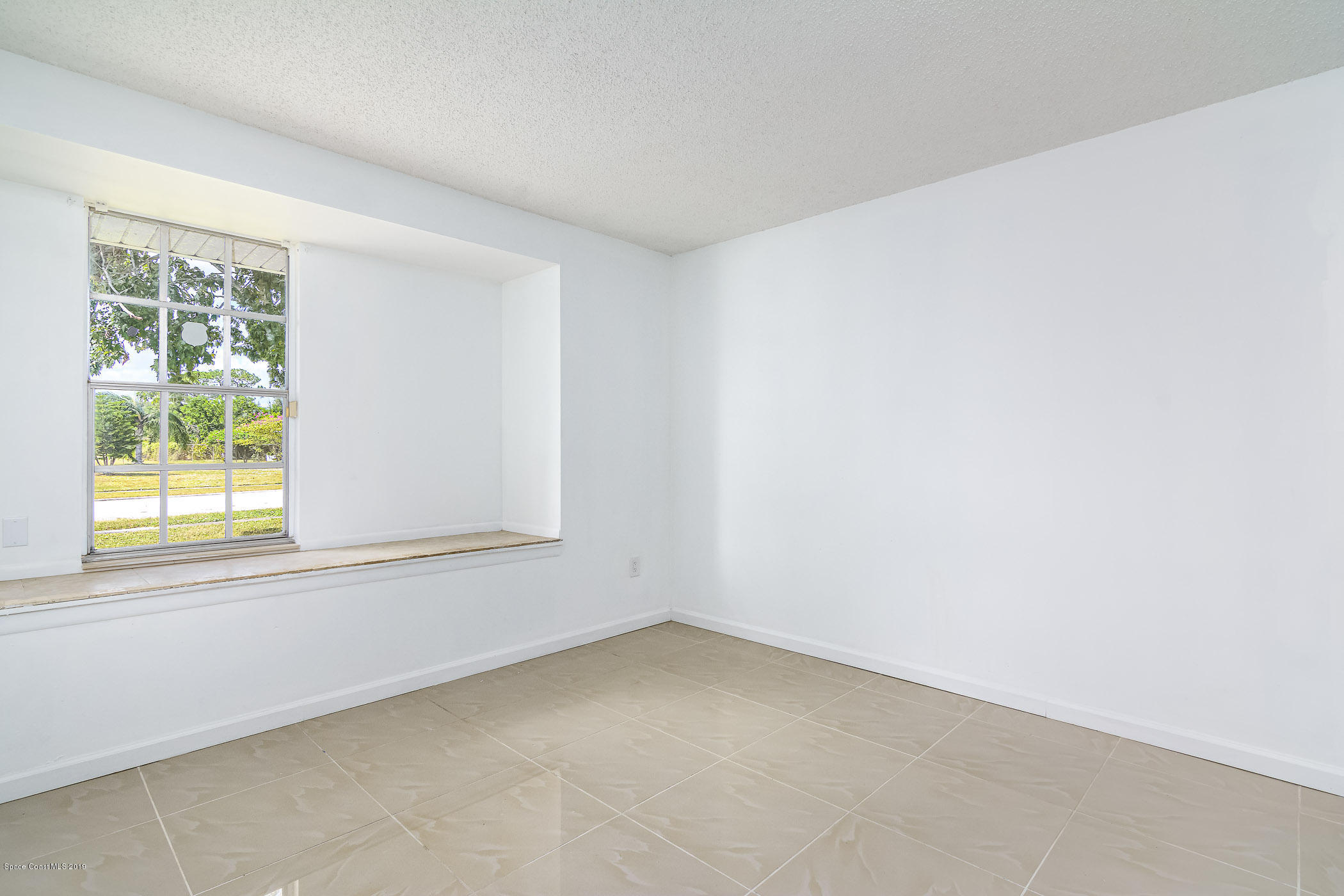 1111 Cotton Road Northeast Palm Bay, FL 32905 - Photo 8 of 27 Master Bedroom