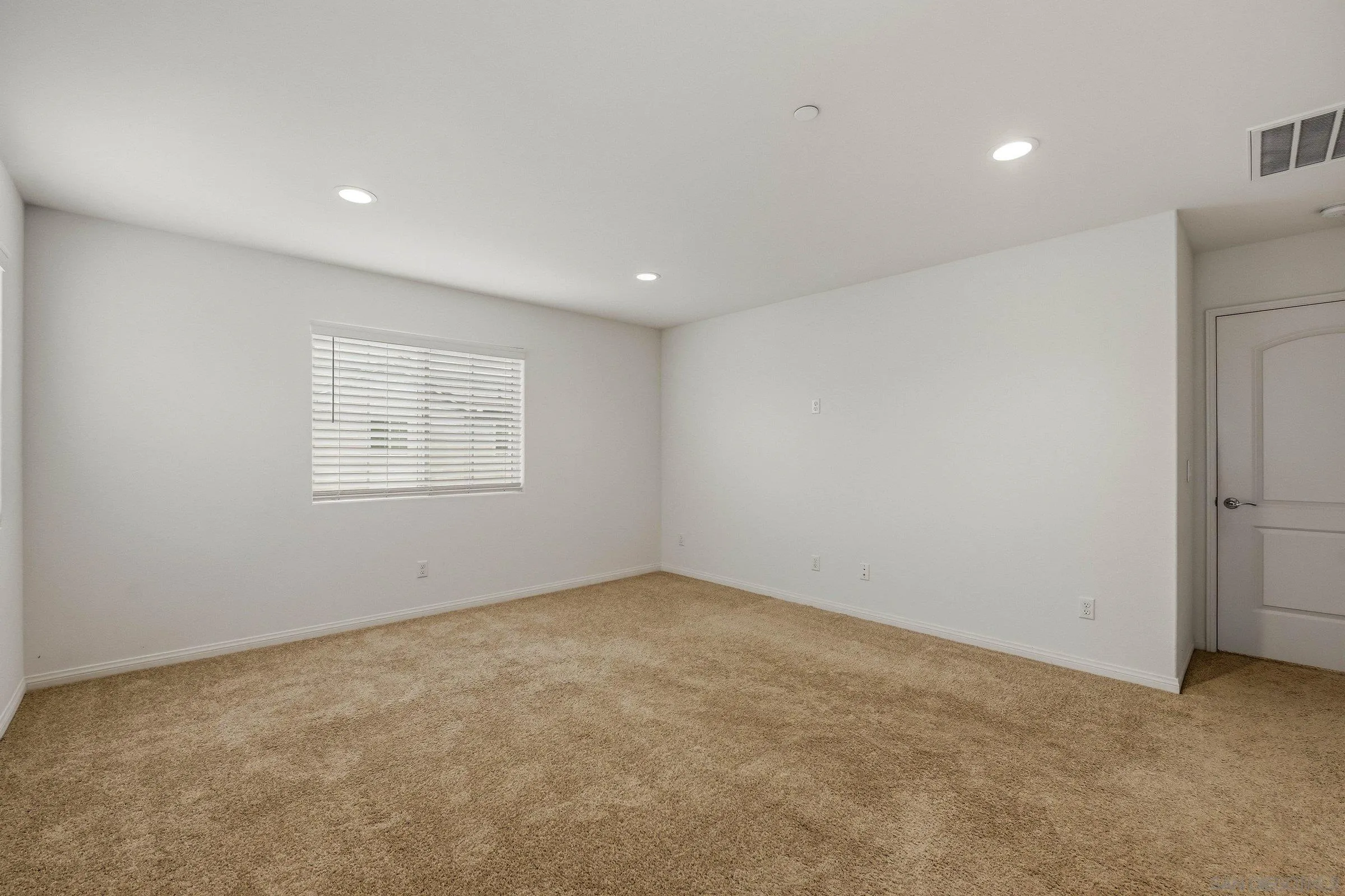 5429 Meridian Place Bonsall, CA 92003 - Photo 26 of 31 a view of an empty room with a window