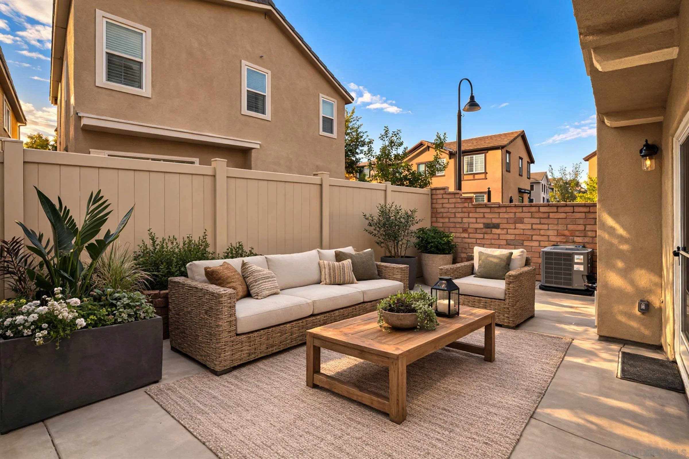 5429 Meridian Place Bonsall, CA 92003 - Photo 28 of 31 a patio with patio couch and potted plants