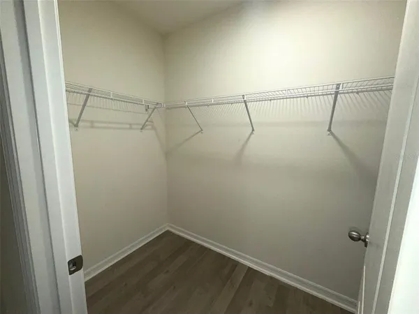 a view of a room with racks on the wall