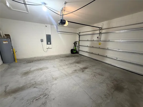 a view of an empty room with a windows