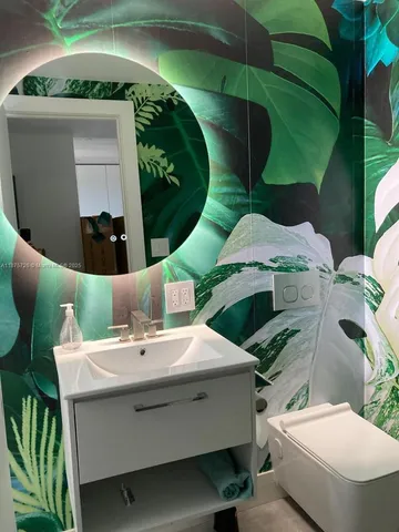 a view of a balcony and floor to ceiling window