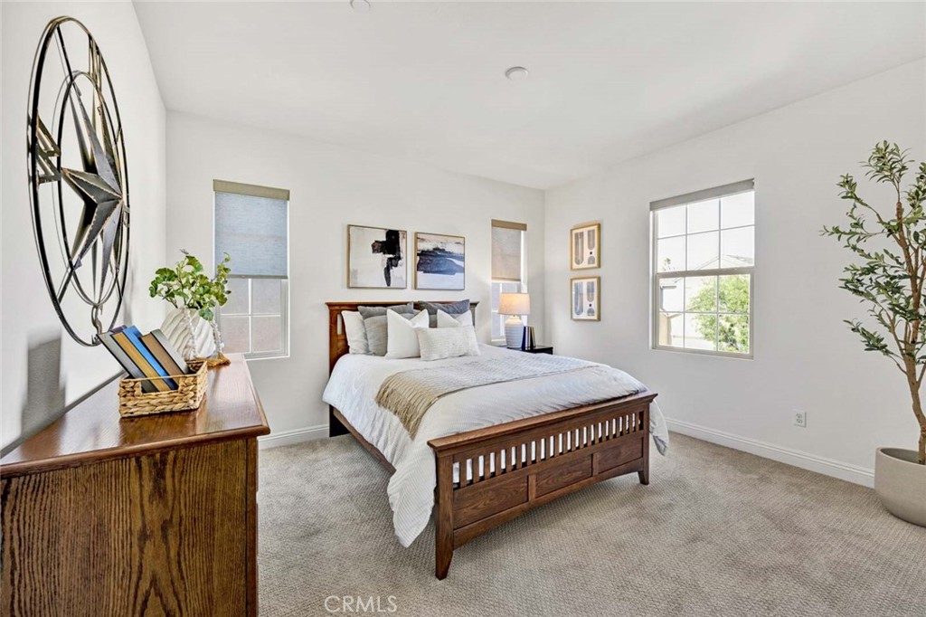 222 Barnes Road Tustin, CA 92782 - Photo 15 of 31 a bedroom with a bed and a window