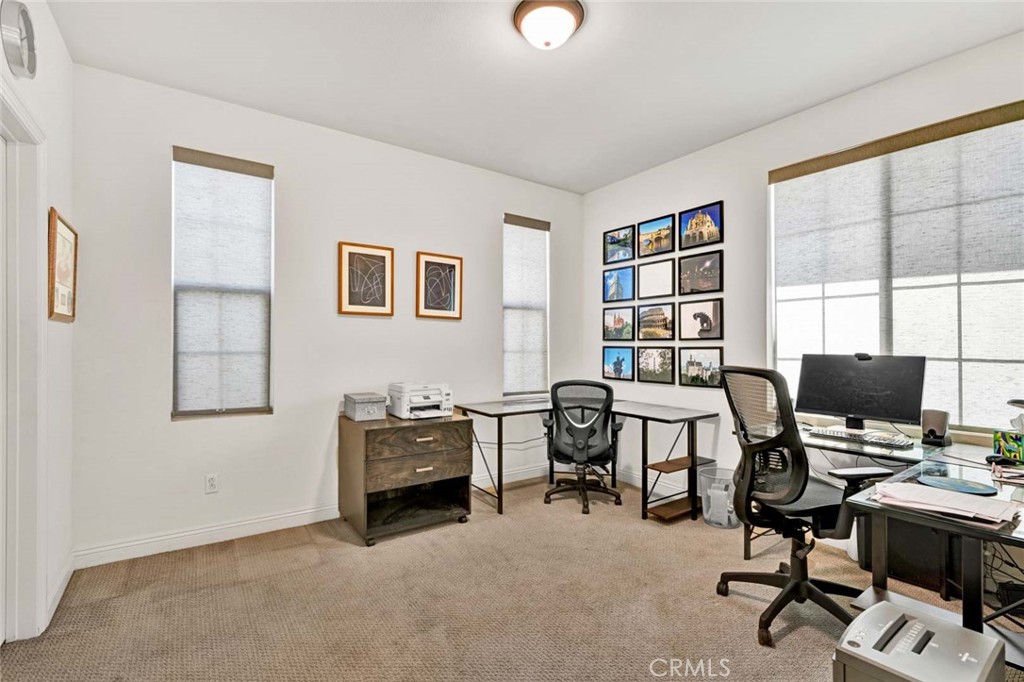 222 Barnes Road Tustin, CA 92782 - Photo 17 of 31 a view of a workspace with furniture and a window