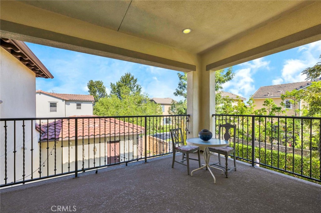 222 Barnes Road Tustin, CA 92782 - Photo 19 of 31 a view of a chairs and table in balcony