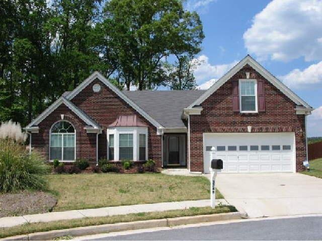 3289 Kings Bay Court Decatur, GA 30034 - Photo 1 of 1 a front view of a house with a garden