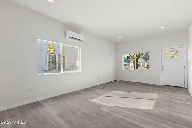 an empty room with windows