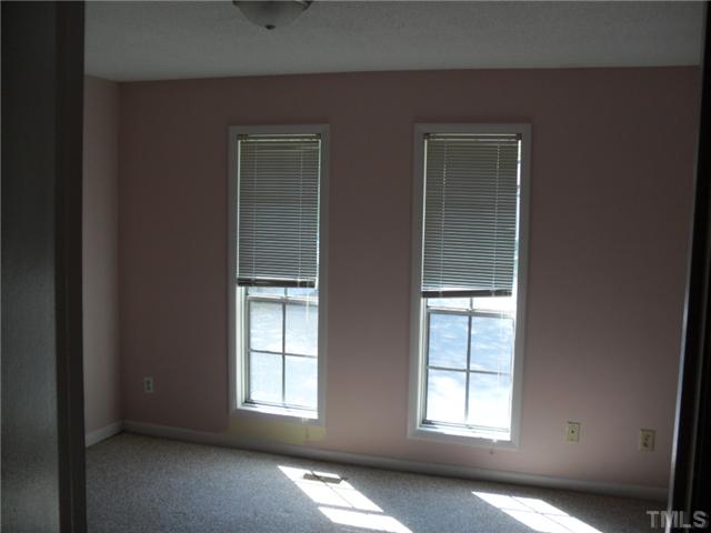 1304 Seaton Road, Unit T2 Durham, NC 27713 - Photo 8 of 8 an empty room with windows