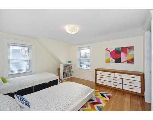 121 Overlook Road Arlington, MA 02474 - Photo 22 of 30 a bedroom with furniture and a flat screen tv