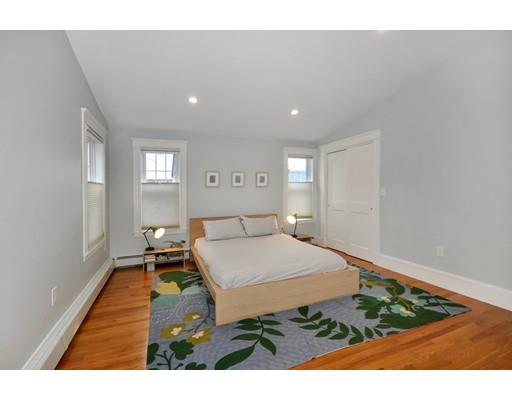 121 Overlook Road Arlington, MA 02474 - Photo 25 of 30 a living room with furniture and a rug
