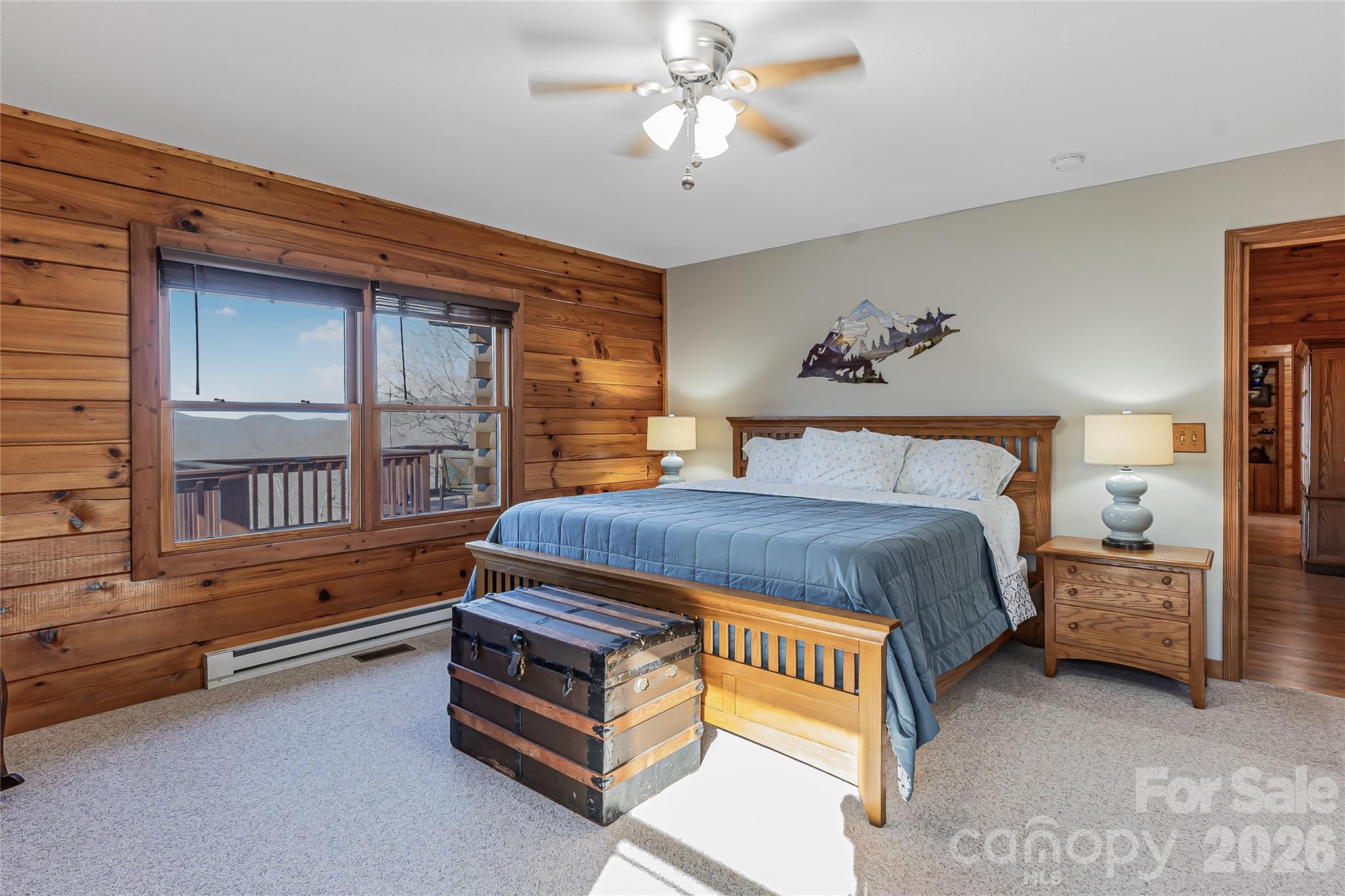 206 Amelia Lane Bostic, NC 28018 - Photo 25 of 48 a spacious bedroom with a bed and a window
