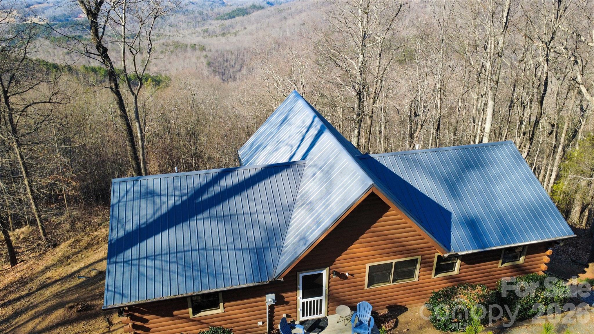 206 Amelia Lane Bostic, NC 28018 - Photo 38 of 48 a view of house with a trees