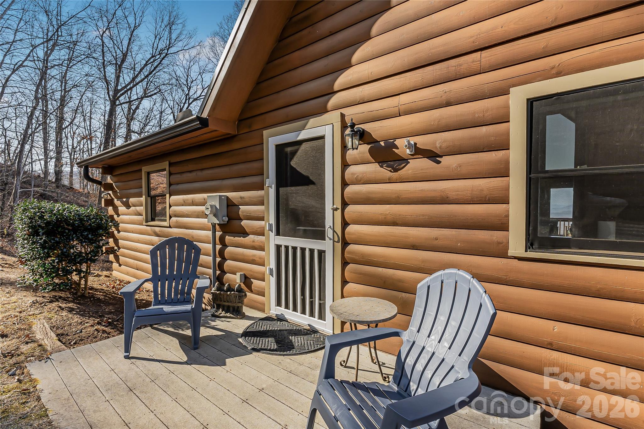 206 Amelia Lane Bostic, NC 28018 - Photo 39 of 48 a view of a chairs and table in the balcony