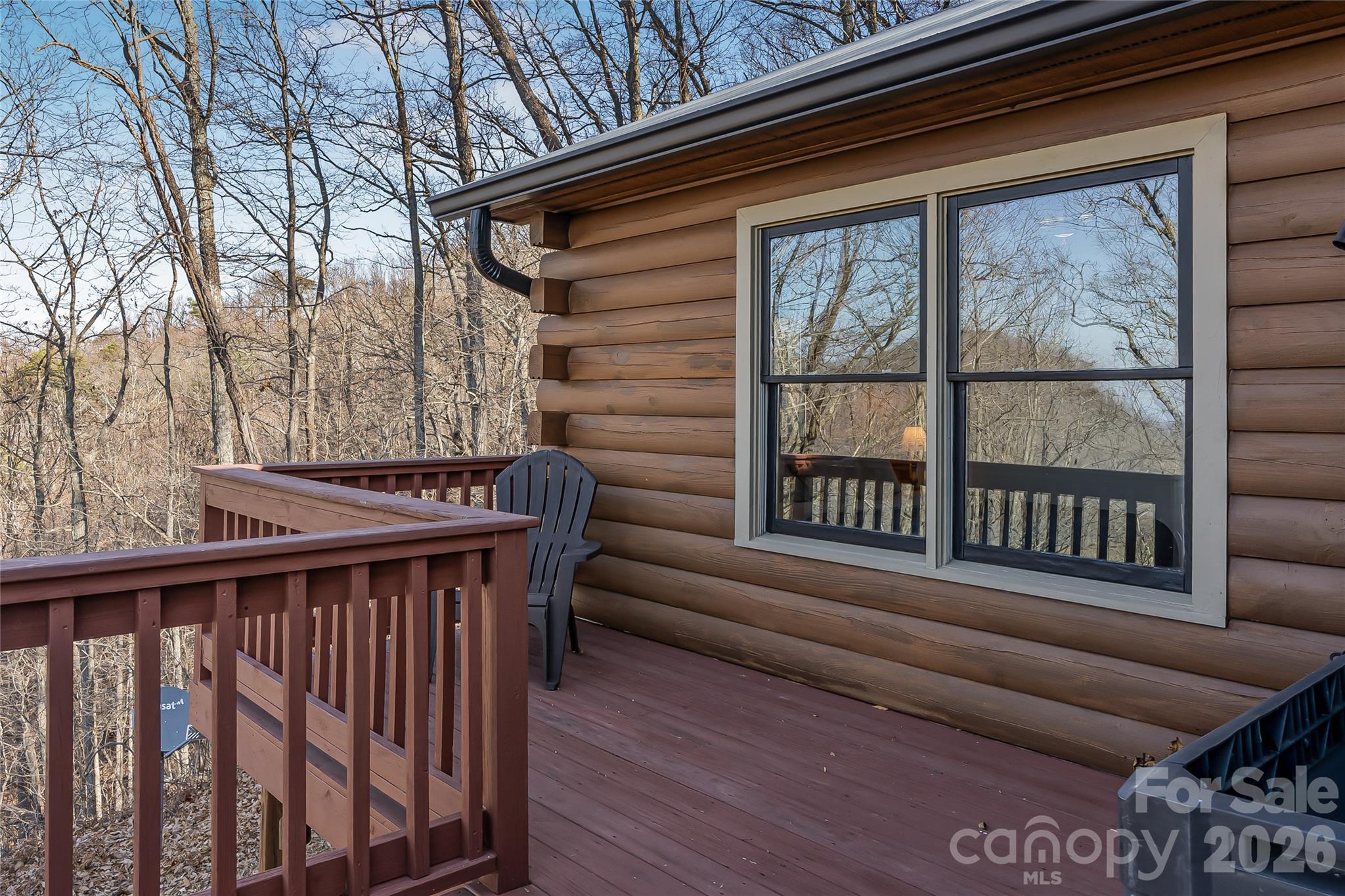 206 Amelia Lane Bostic, NC 28018 - Photo 40 of 48 a balcony with furniture and wooden floor