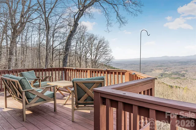 a view of balcony with furniture