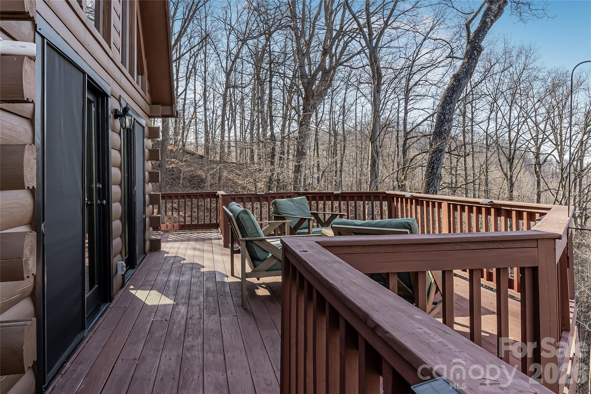 206 Amelia Lane Bostic, NC 28018 - Photo 46 of 48 a view of balcony with furniture and wooden floor