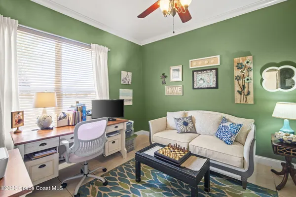 a living room with furniture and a window