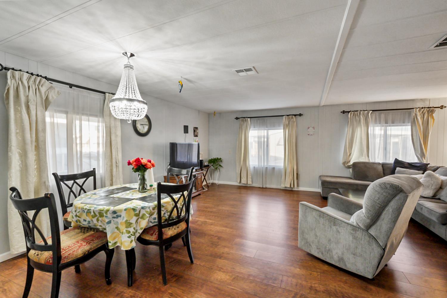 1400 North Tully Road, Unit 137 Turlock, CA 95380 - Photo 12 of 37 a view of a livingroom with furniture and window