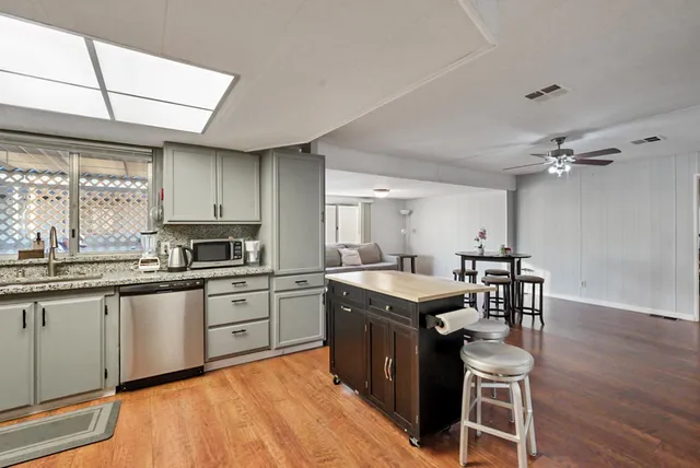 a room with a table and chairs