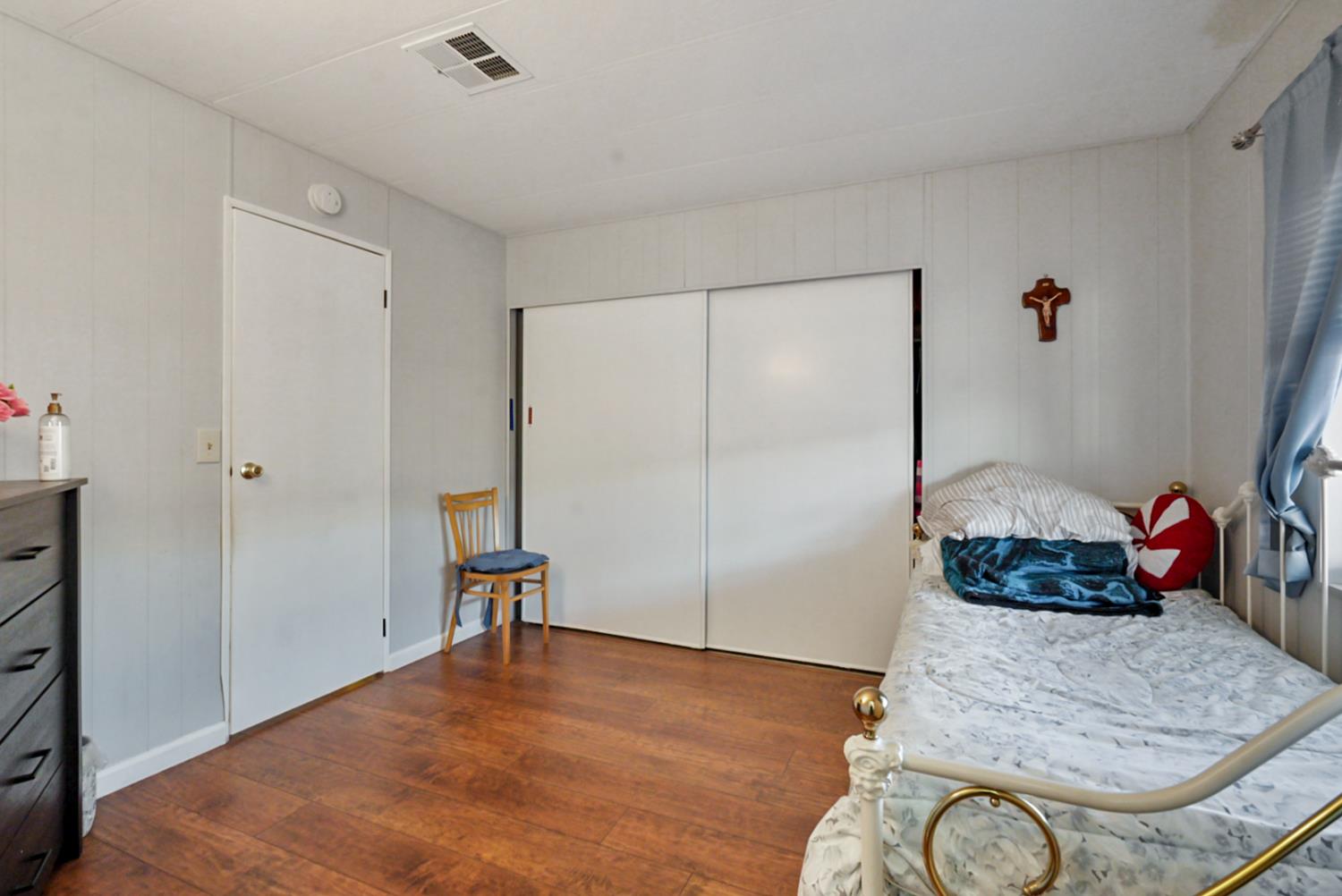 1400 North Tully Road, Unit 137 Turlock, CA 95380 - Photo 21 of 37 a view of a livingroom with furniture and hardwood floor