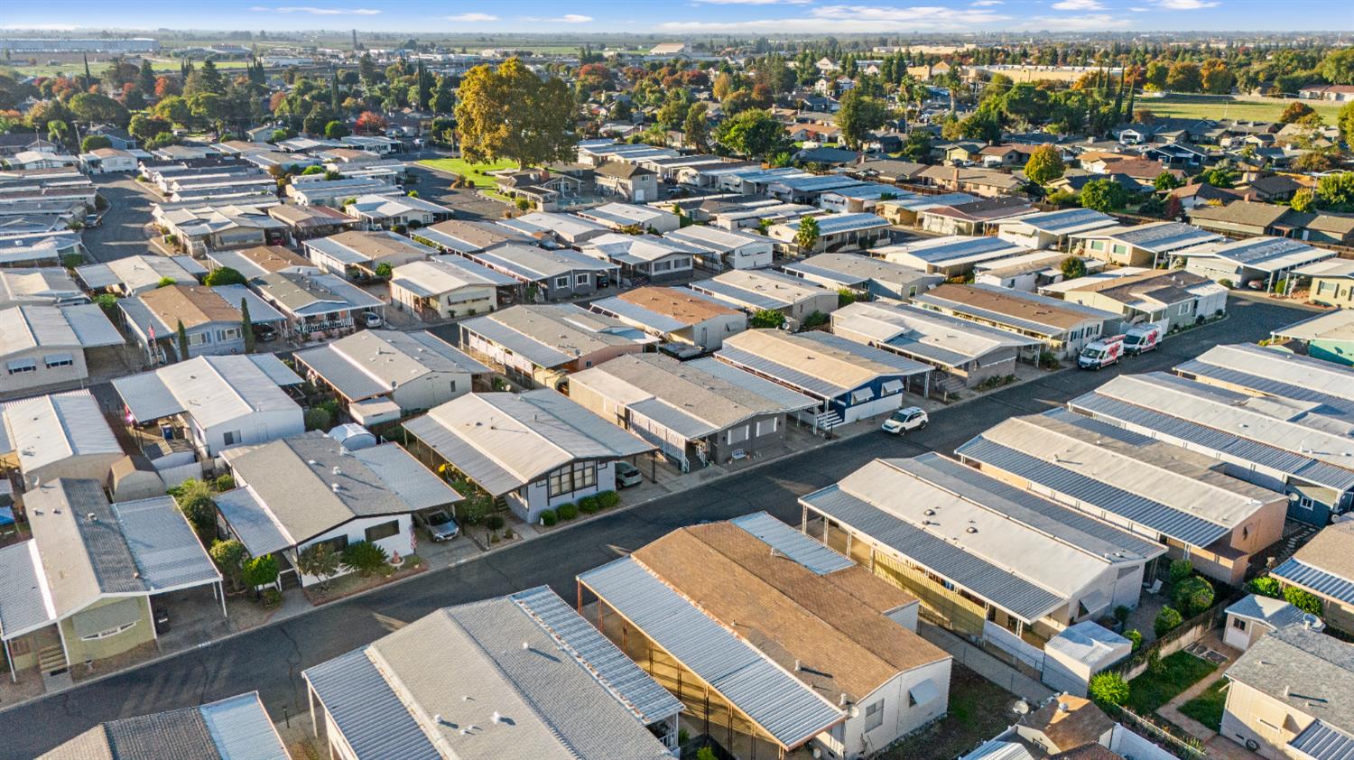 1400 North Tully Road, Unit 137 Turlock, CA 95380 - Photo 32 of 37 an aerial view of a city with lots of residential buildings