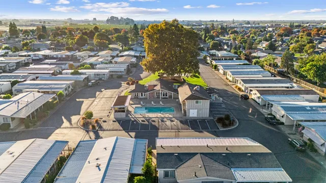 an aerial view of a house with a garden