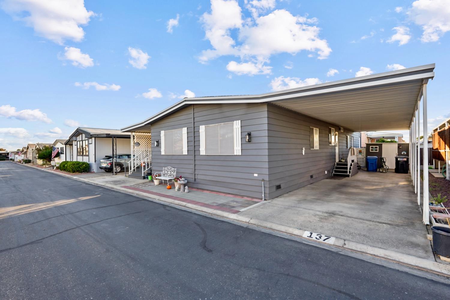 1400 North Tully Road, Unit 137 Turlock, CA 95380 - Photo 4 of 37 a view of a house with a street