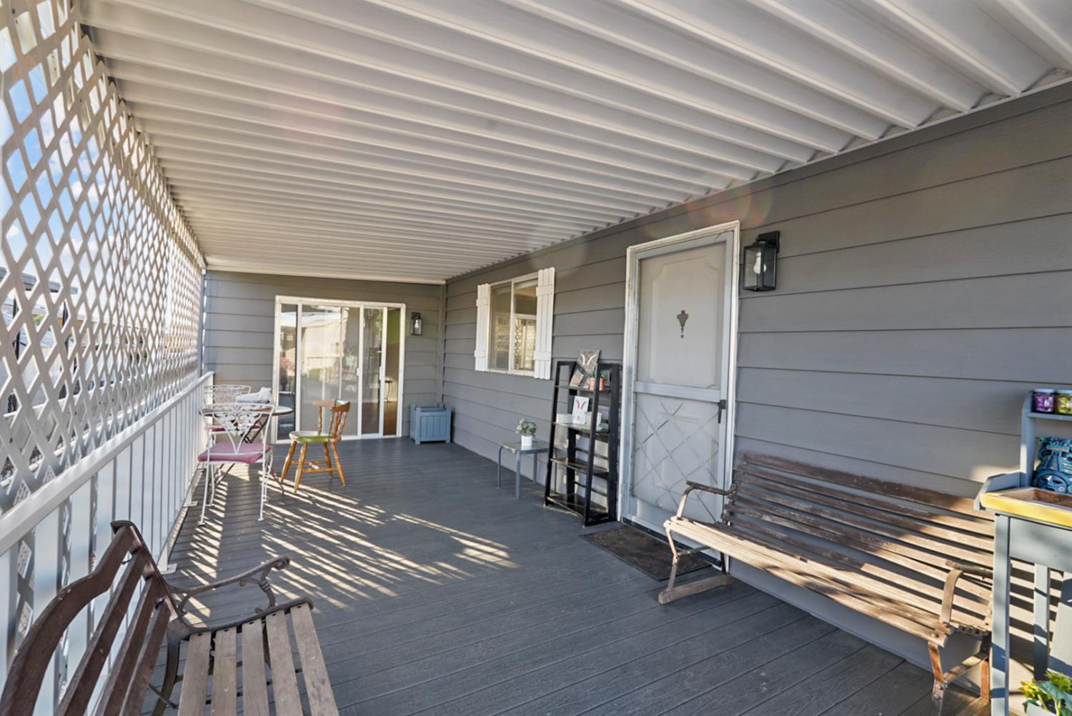 1400 North Tully Road, Unit 137 Turlock, CA 95380 - Photo 6 of 37 a view of outdoor seating space with wooden floor
