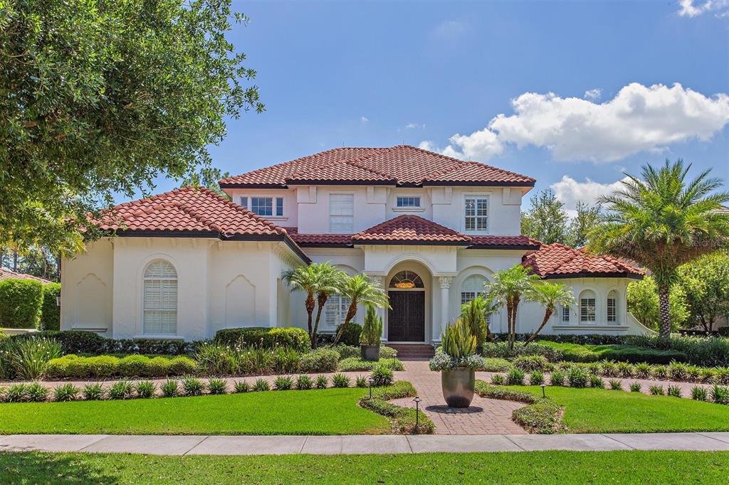 6839 Valhalla Way Windermere, FL 34786 - Photo 1 of 1 a front view of a house with a yard