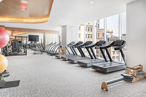 1 Franklin Street, Unit 3701 Boston, MA 02110 - Photo 19 of 26 a view of a room with gym equipment