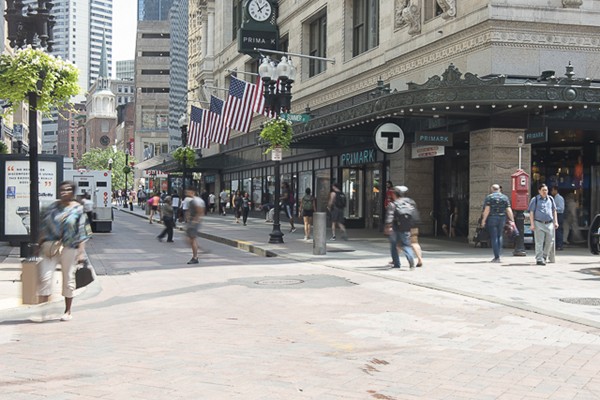 1 Franklin Street, Unit 3701 Boston, MA 02110 - Photo 25 of 26 a group of people walking down a street