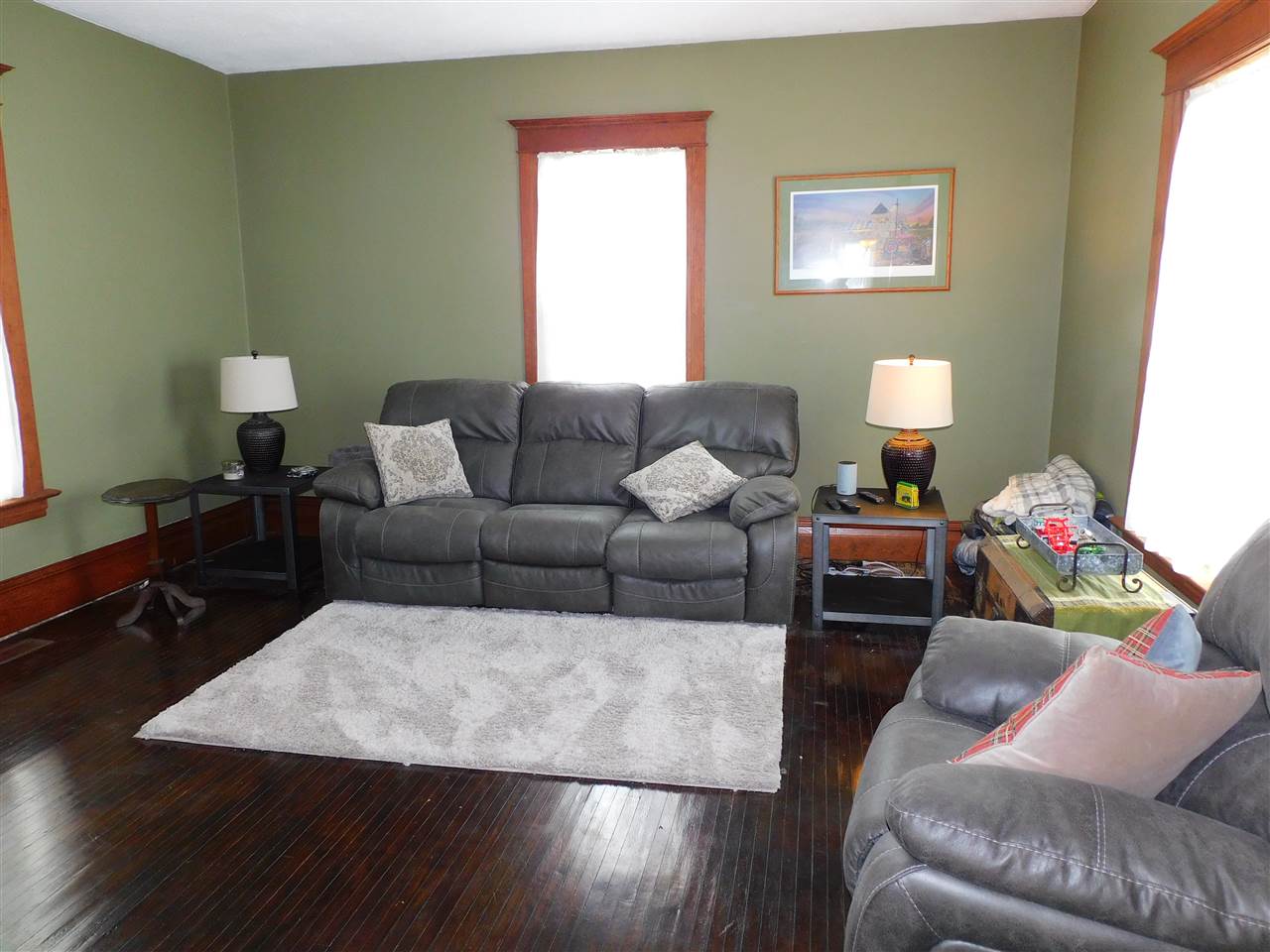 11669 Russellville Road Belvidere, IL 61008 - Photo 5 of 19 a living room with furniture and a wooden floor