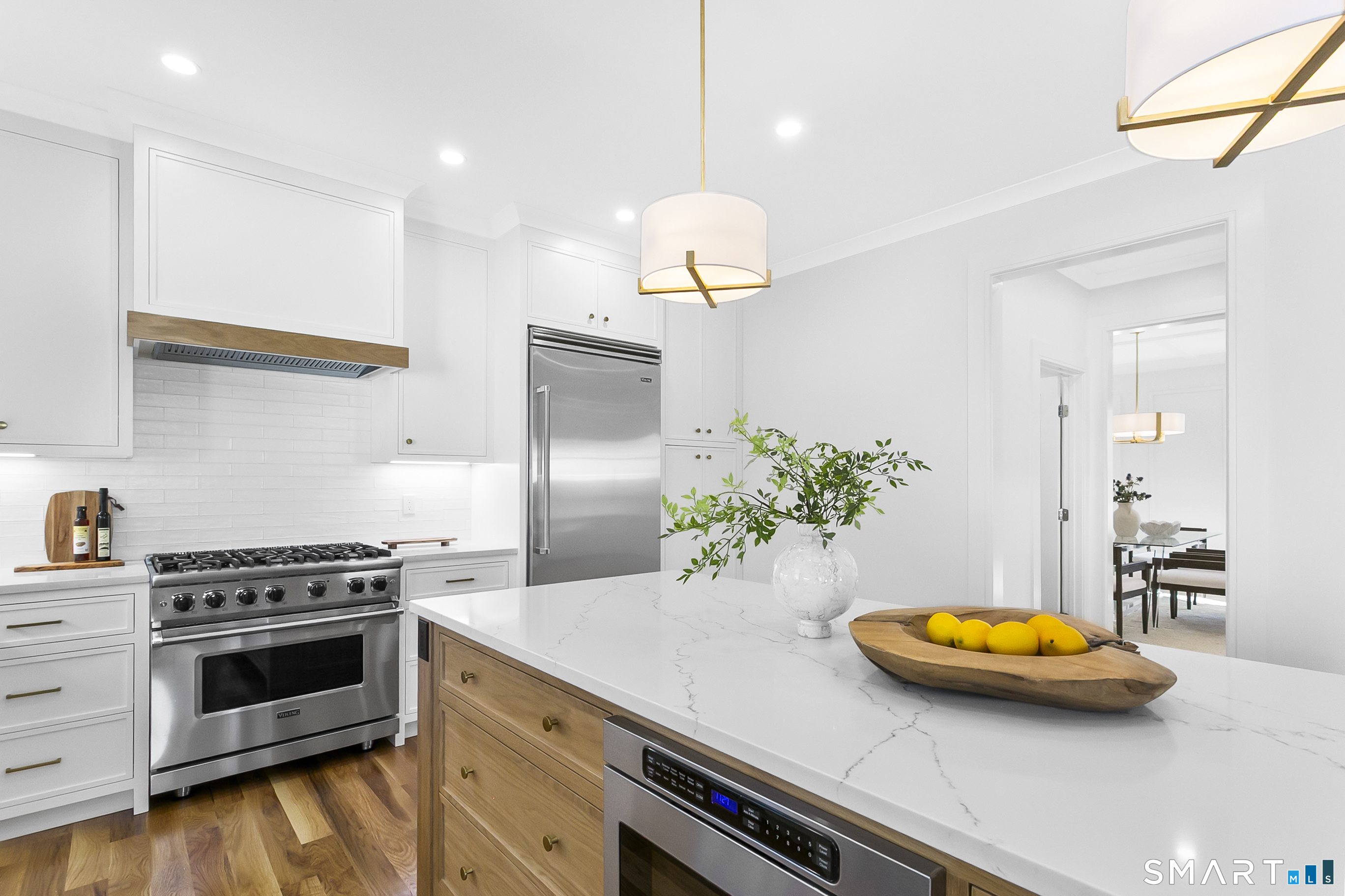 68 Figlar Avenue Fairfield, CT 06824 - Photo 3 of 40 Large island is great for storage and extra seating.