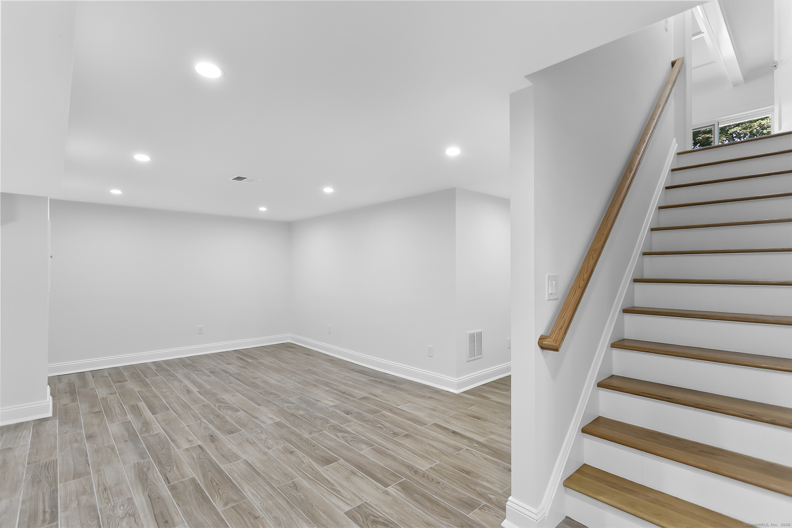 68 Figlar Avenue Fairfield, CT 06824 - Photo 31 of 40 Lower level recreation room.