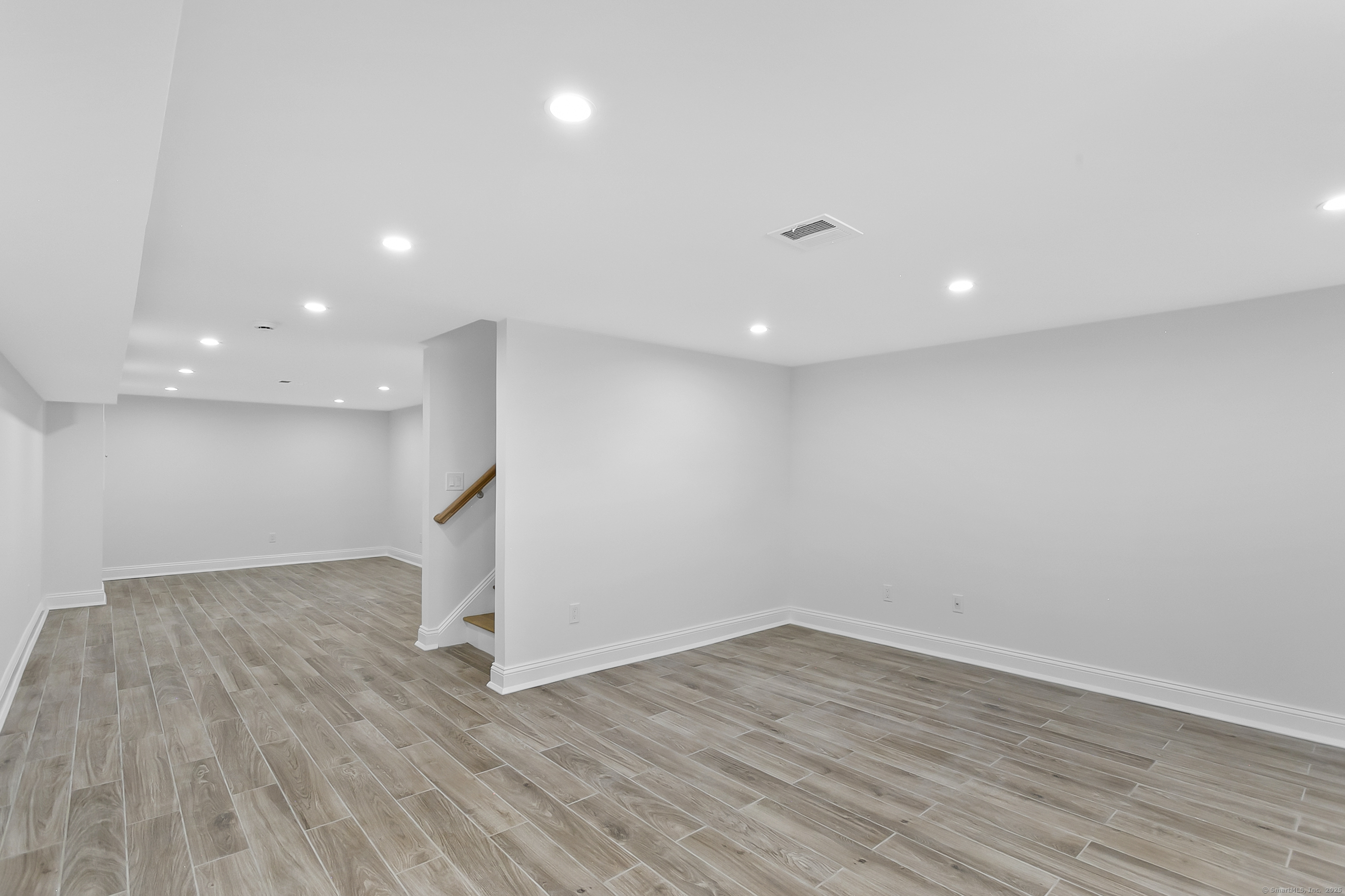 68 Figlar Avenue Fairfield, CT 06824 - Photo 32 of 40 Lower level with gorgeous tile flooring.