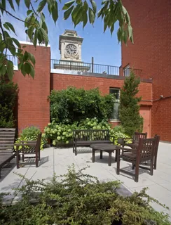 a view of a bench in a backyard