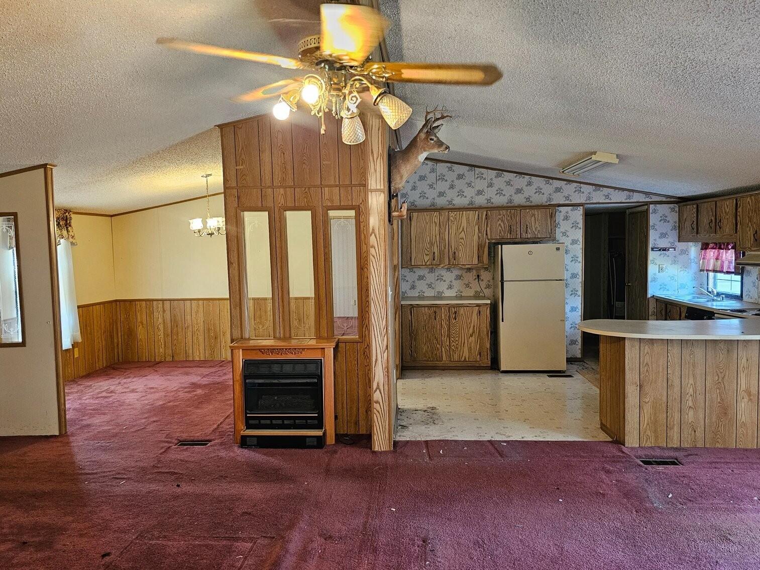 1810 Scuffling Hill Road Rocky Mount, VA 24151 - Photo 19 of 38 a view of a kitchen with a sink and a refrigerator