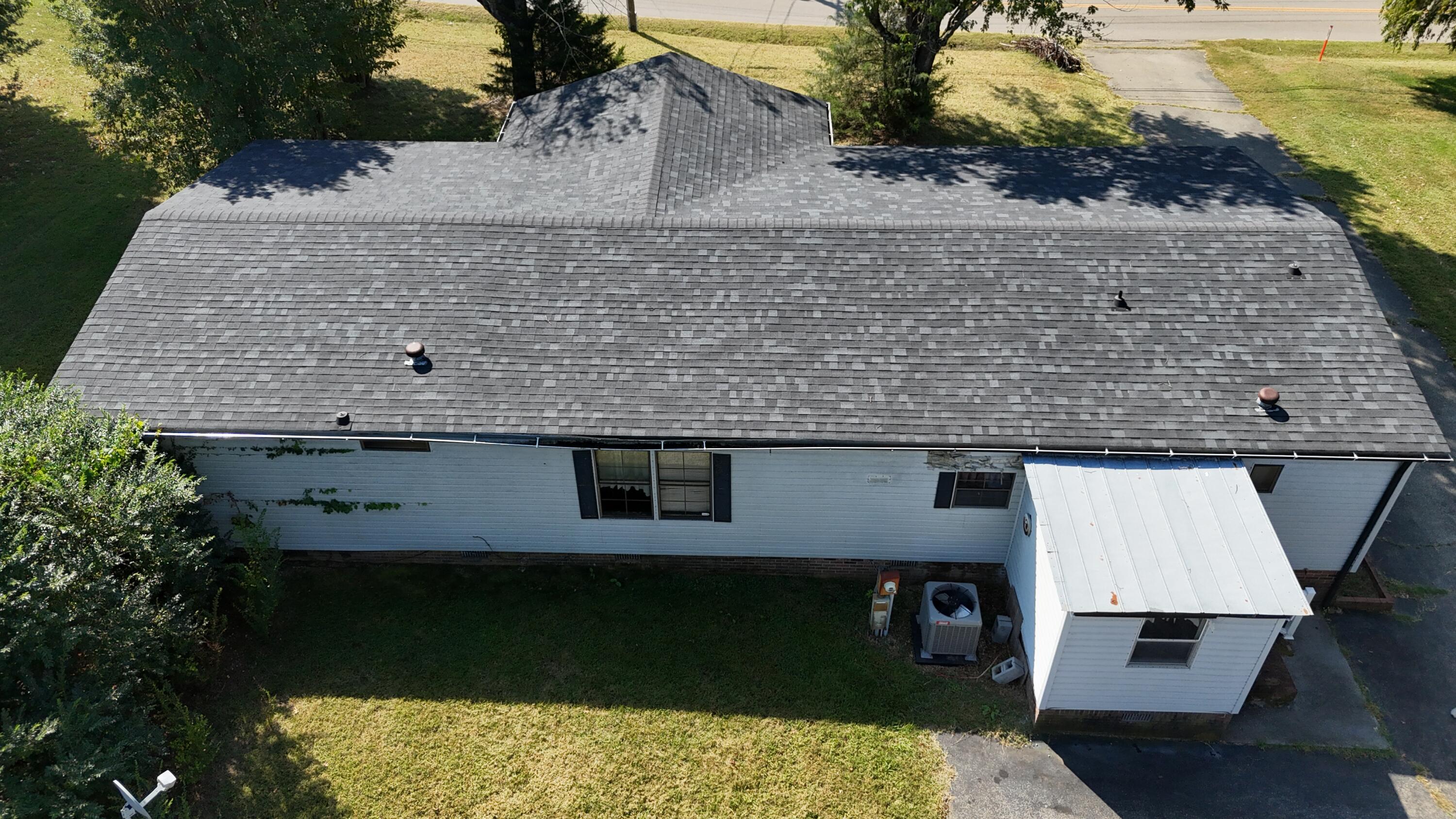 1810 Scuffling Hill Road Rocky Mount, VA 24151 - Photo 34 of 38 an aerial view of a house with a yard