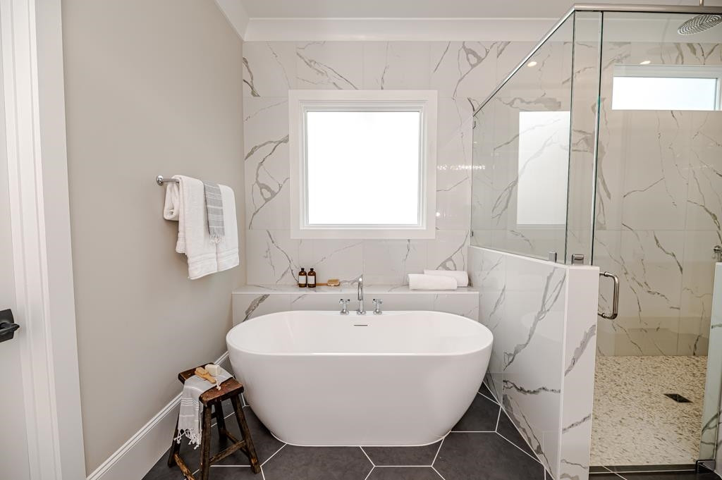 7920 Hardwick Drive Raleigh, NC 27615 - Photo 26 of 53 a bathroom with a sink a toilet and shower